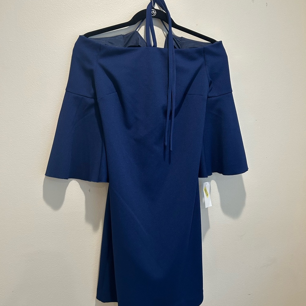 Navy blue off the shoulder Trina dress. New. Tags attached size 10